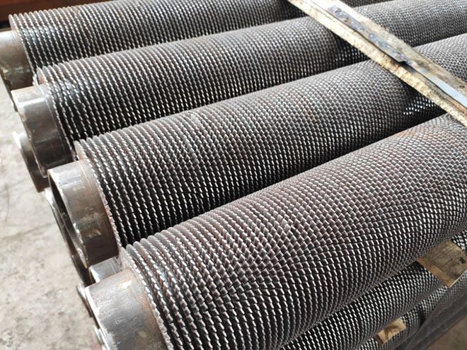 Serrated finned tubes