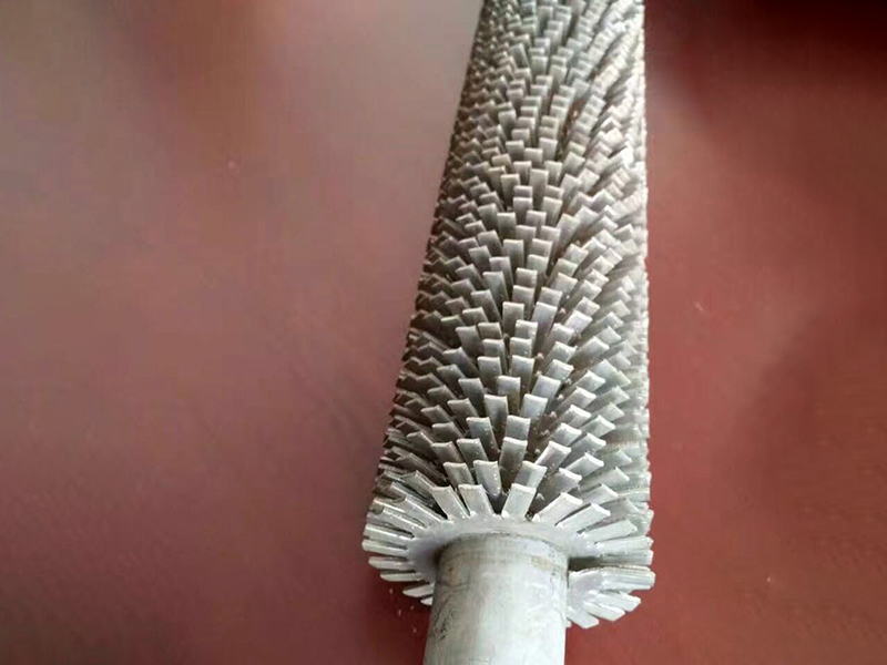 Serrated finned tubes
