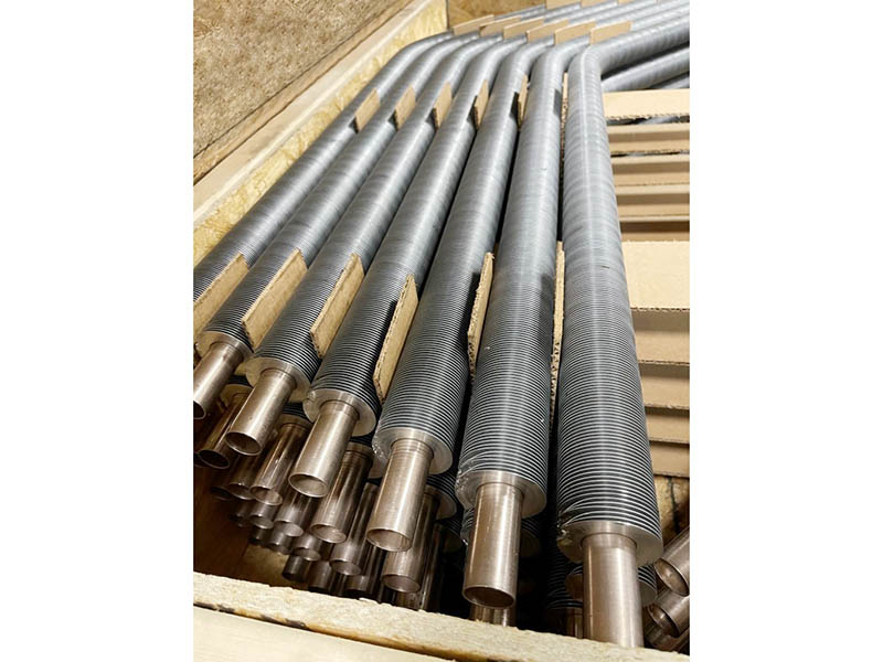 Spiral wound finned tubes
