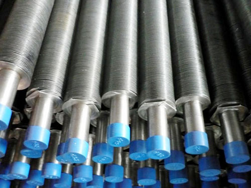 Spiral wound finned tubes