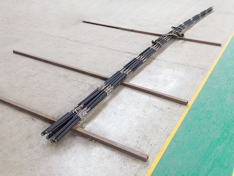 Spiral wound finned tubes